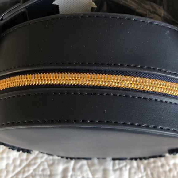 NWT blue round crossbody purse with floral embellishments on the front - Picture 3 of 4